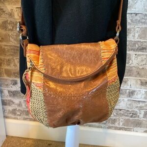 The Sak Ventura Patchwork leather & Crochet crossbody bag.Magnet closure.Brown.